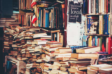 VENICE, ITALY - OCTOBER 12, 2015: Books are on sale in a secondhand bookshop in Venice, Italy. Toned pictureのeditorial素材