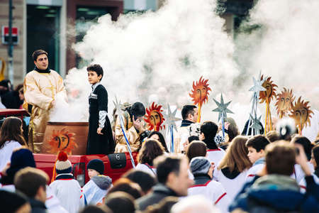 GEORGIA, TBILISI - JANUARY 7, 2016:  Participants march during Alilo, a religious procession to celebrate Orthodox Christmas in center of Tbilisi, Georgia, Caucasus region. Toned in old film styleのeditorial素材