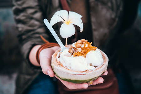 Coconut ice cream with nuts in Thailandの写真素材