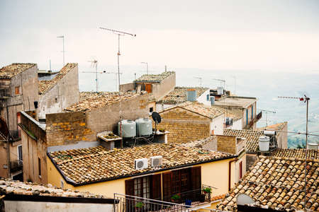 View of village on a foggy day in Caltabellotta, Sicily, Italy.の写真素材