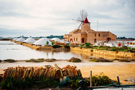 Salt mills are seen in saburbs of Marsala, Sicily, Italy.の写真素材