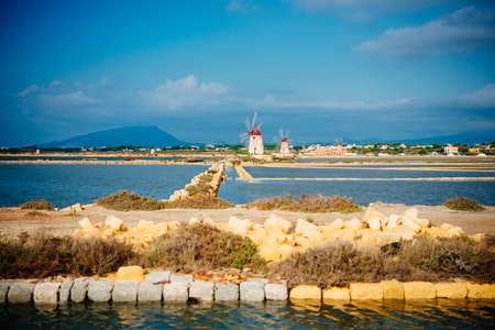 Salt mills are seen in saburbs of Marsala, Sicily, Italy.の写真素材
