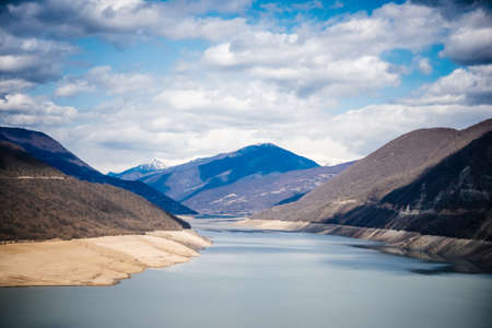 Zhinvali reservoir lake landscape with mountains in Georgia, Caucasus.の写真素材
