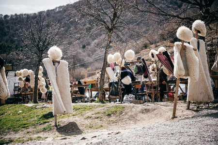 Traditional Georgian fur hats and coats made of sheep wool in Georgia, Caucasusの写真素材