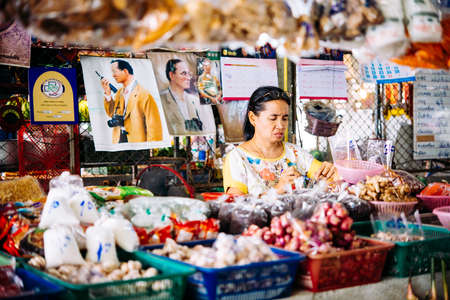 KOH SAMUI, THAILAND - MARCH 14, 2016: One of the shop owners at one of the street markets at Koh Samui, Thailand.のeditorial素材