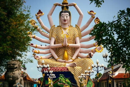 Statue of Shiva in Wat Plai Laem Temple on Koh Samui island in Thailandの写真素材