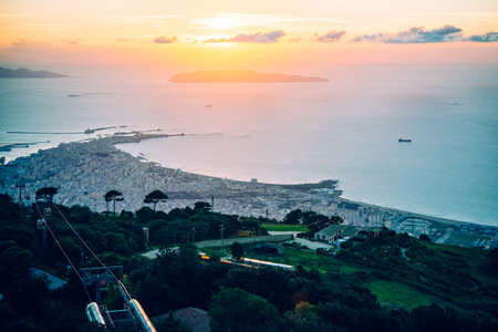 Panoramic sunset view of Trapani seen from Erice mountain in Sicily, Italy.の写真素材