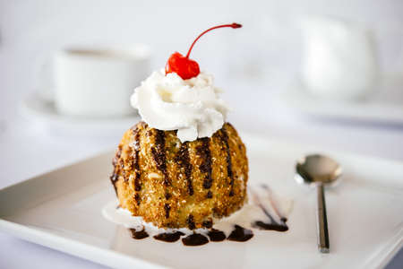 Fried ice cream served on white plateの写真素材