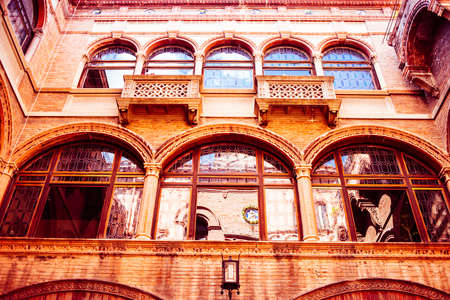 Beautiful building in the old city of Bologna, Emilia Romagna region, Italy.の写真素材