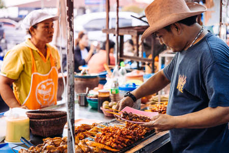 KOH SAMUI, THAILAND - FEBRUARY 18, 2016: Street food market in one of the villages of Koh Samui, Thailand.のeditorial素材
