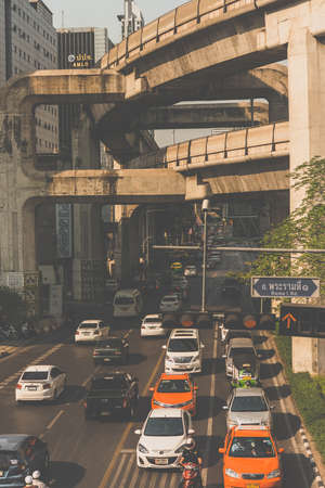BANGKOK, THAILAND - FEBRUARY 26, 2016: Heavy traffic at one of the streets in Bangkok, Thailand. Toned pictureのeditorial素材