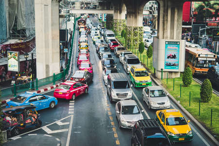 BANGKOK, THAILAND - FEBRUARY 26, 2016: Heavy traffic at one of the streets in Bangkok, Thailand. Toned pictureのeditorial素材