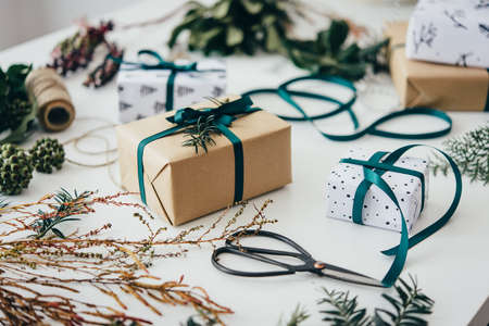 Christmas or New year gift packing. Holiday decor concept.の写真素材
