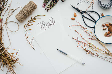 Christmas or New year holiday decoration concept. Blank paper sheet with copyspace. Top viewの写真素材