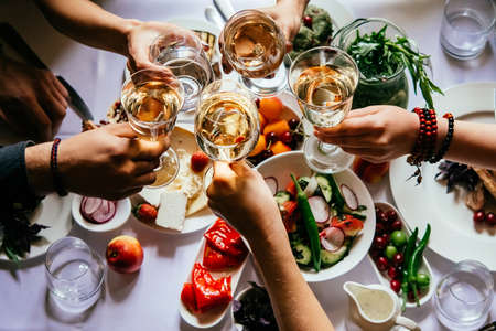 Party dinner table, celebrating with friends of family served at home or in a restaurant.の写真素材
