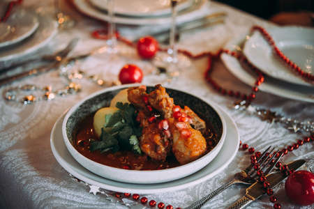Traditional georgian dish Chakhokhbili served on a party tableの写真素材