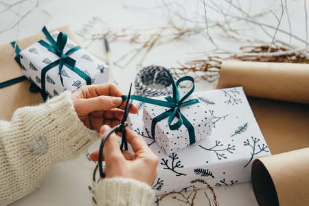 Christmas or New year gift packing. Holiday decor concept.の写真素材