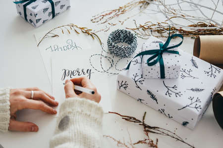 Christmas or New year gift packing. Holiday decor concept.の写真素材