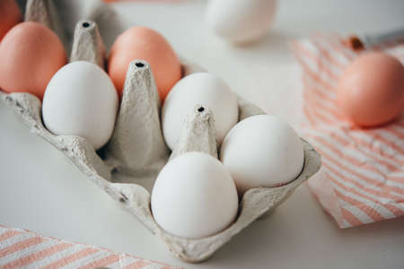 Modern style easter eggs in a box. Gold foil and pink acryllic pain hand made artの写真素材