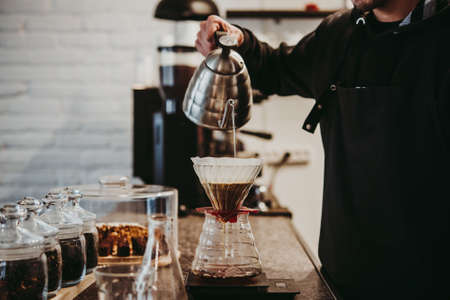 Making pour-over coffee with a filter dripper