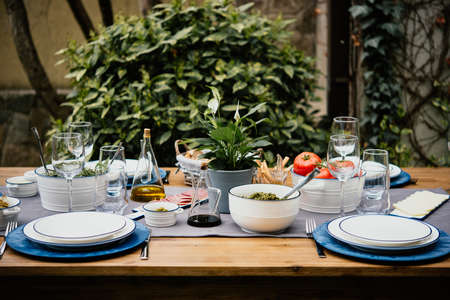 Table served for party dinner in mediterranean styleの写真素材