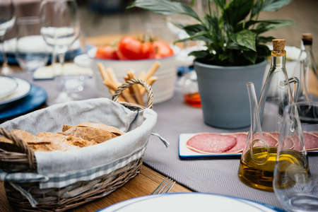 Table served for party dinner in mediterranean styleの写真素材