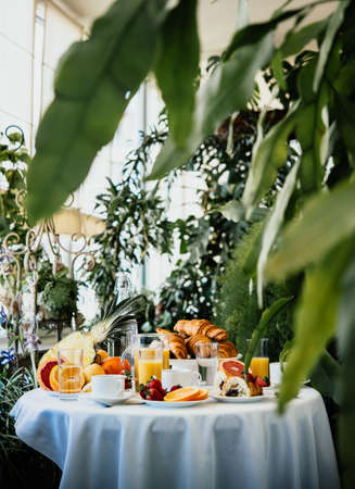 Continental breakfast served in a garden or cafe
