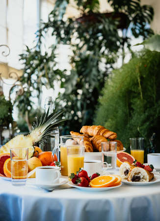 Continental breakfast served in a garden or cafeの写真素材