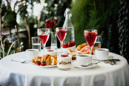 Continental breakfast served in a garden or cafeの写真素材
