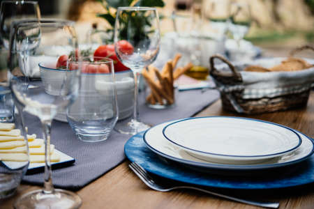 Table served for party dinner in mediterranean styleの写真素材