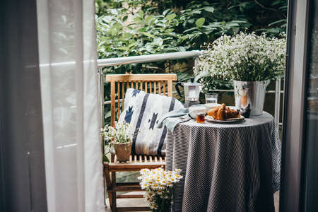 Breakfast served on a beautiful terrace or balconyの写真素材