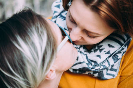 Close-up of lesbian couple kissing