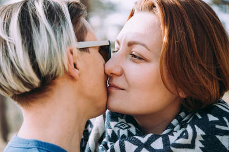 Close-up of lesbian couple kissingの写真素材