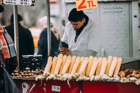ISTANBUL, TURKEY - 29 JANUARY, 2017: Chestnut and corn seller in one of the streets in Istanbul, Turkey.のeditorial素材