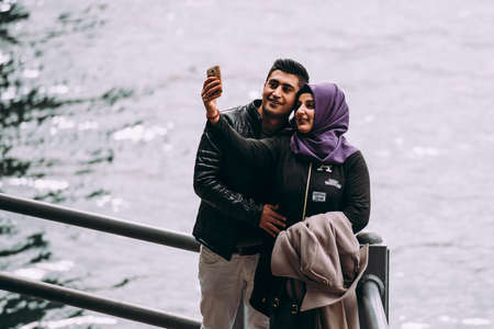 ISTANBUL, TURKEY - 29 JANUARY, 2017: Tourists take pictures at the Galata bridge in Istanbul, Turkey.のeditorial素材