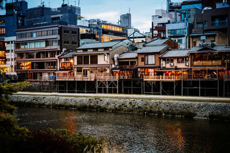 View of traditional houses by the Kamo river in Kyoto, Japan.のeditorial素材