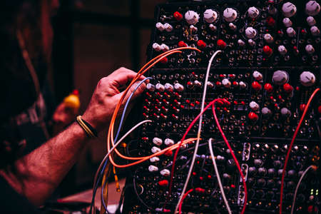 Making music using modular synthesizers. Electronic music and professional music equipment concept.の写真素材