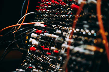 A close-up of a modular synthesizer. Electronic music and professional music equipment concept.の写真素材