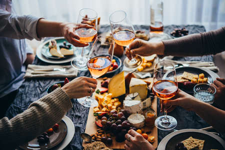 Glasses of rose wine seen during a friendly party of a celebration.の写真素材