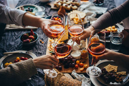 Glasses of rose wine seen during a friendly party of a celebration.の写真素材