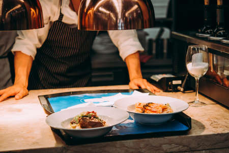 Dinner served at one of the restaurants at TimeOut Market in Lisbon, Portugal.の写真素材