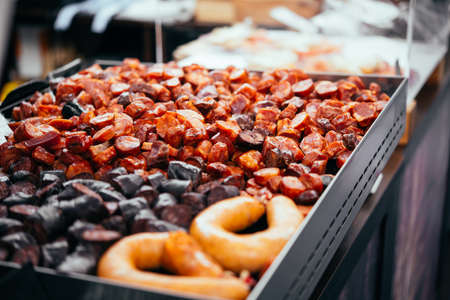 Traditional Portuguese sausages grilled at one the street markets of Lisbon, Portugal.の写真素材