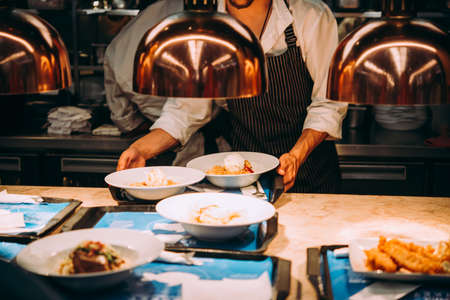 Dinner served at one of the restaurants at TimeOut Market in Lisbon, Portugal.の写真素材