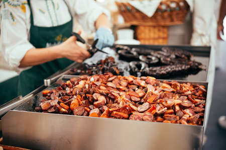 Traditional Portuguese sausages grilled at one the street markets of Lisbon, Portugal.の写真素材