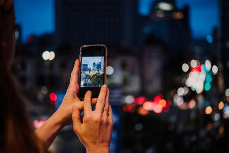 Taking a photo of the night street view