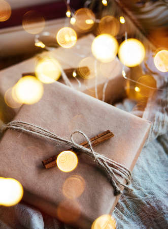 Wrapping presents and making decorations for Christmas or New Year celebration.の写真素材