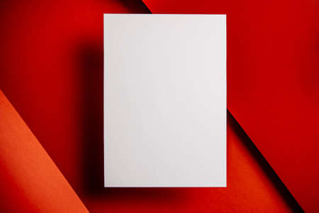 Stylish white blank paper mockup on a colorful background. Document and presentation stationery...