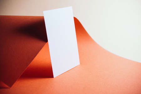 Stylish white blank paper mockup on a colorful background. Document and presentation stationery...