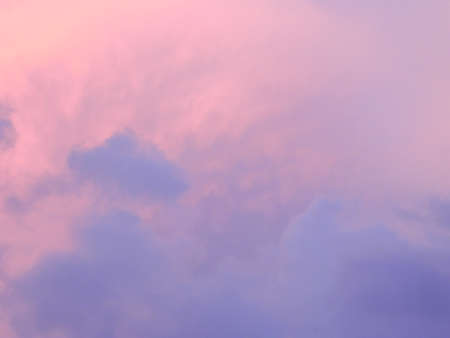 Vividly colorful magenta, pink, and purple sky horizon.の写真素材