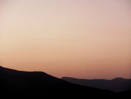 A vividly descriptive and somber view of a South American mountain range.の写真素材